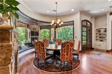 This custom estate sits on a rare 1.4-acre wooded lot backing to on The Traditions Club At Texas A and M in Texas - for sale on GolfHomes.com, golf home, golf lot