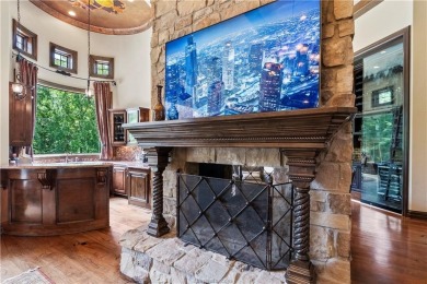 This custom estate sits on a rare 1.4-acre wooded lot backing to on The Traditions Club At Texas A and M in Texas - for sale on GolfHomes.com, golf home, golf lot