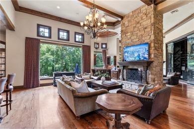 This custom estate sits on a rare 1.4-acre wooded lot backing to on The Traditions Club At Texas A and M in Texas - for sale on GolfHomes.com, golf home, golf lot
