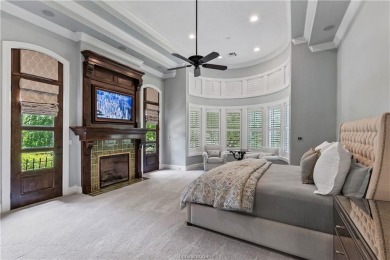 This custom estate sits on a rare 1.4-acre wooded lot backing to on The Traditions Club At Texas A and M in Texas - for sale on GolfHomes.com, golf home, golf lot