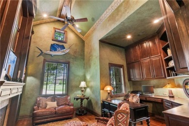 This custom estate sits on a rare 1.4-acre wooded lot backing to on The Traditions Club At Texas A and M in Texas - for sale on GolfHomes.com, golf home, golf lot