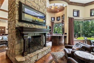 This custom estate sits on a rare 1.4-acre wooded lot backing to on The Traditions Club At Texas A and M in Texas - for sale on GolfHomes.com, golf home, golf lot