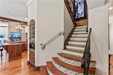 This custom estate sits on a rare 1.4-acre wooded lot backing to on The Traditions Club At Texas A and M in Texas - for sale on GolfHomes.com, golf home, golf lot