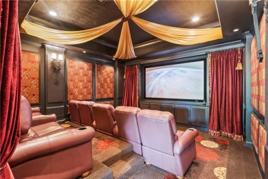 This custom estate sits on a rare 1.4-acre wooded lot backing to on The Traditions Club At Texas A and M in Texas - for sale on GolfHomes.com, golf home, golf lot