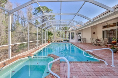 Welcome to this stunning 3-bedroom + office, 3-bathroom, pool on Glen Lakes Country Club in Florida - for sale on GolfHomes.com, golf home, golf lot