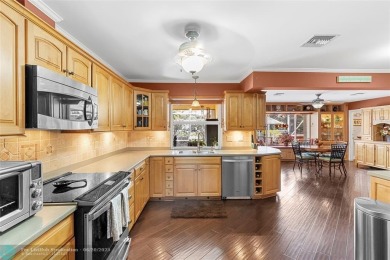 Unique Key West-style waterfront retreat in prestigious Golf on Plantation Preserve Golf Course in Florida - for sale on GolfHomes.com, golf home, golf lot