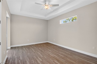 This beautifully crafted newer construction 3-bedroom on Burnt Store Golf Club in Florida - for sale on GolfHomes.com, golf home, golf lot