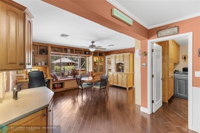 Unique Key West-style waterfront retreat in prestigious Golf on Plantation Preserve Golf Course in Florida - for sale on GolfHomes.com, golf home, golf lot