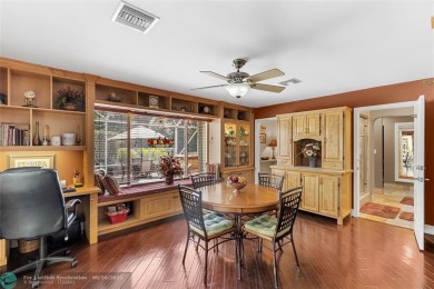 Unique Key West-style waterfront retreat in prestigious Golf on Plantation Preserve Golf Course in Florida - for sale on GolfHomes.com, golf home, golf lot