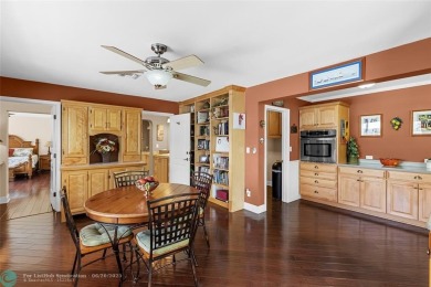 Unique Key West-style waterfront retreat in prestigious Golf on Plantation Preserve Golf Course in Florida - for sale on GolfHomes.com, golf home, golf lot