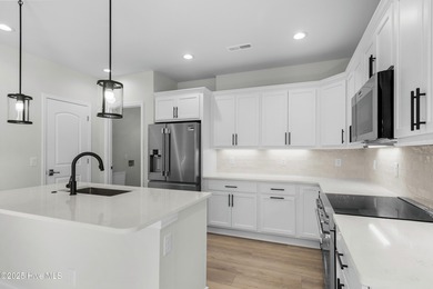 Welcome to The Courtyards by Carrell! This Capri Designer Luxury on Ocean Ridge Plantation in North Carolina - for sale on GolfHomes.com, golf home, golf lot