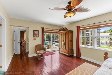 Unique Key West-style waterfront retreat in prestigious Golf on Plantation Preserve Golf Course in Florida - for sale on GolfHomes.com, golf home, golf lot