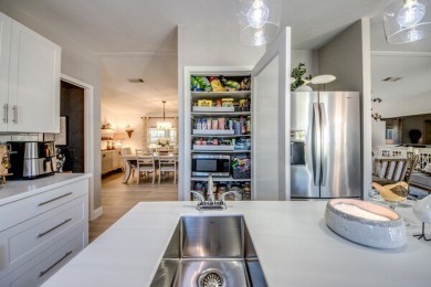 This beautifully updated 1,744 sq. ft. home is located in the on Pine Lakes Country Club in Florida - for sale on GolfHomes.com, golf home, golf lot