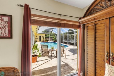 Unique Key West-style waterfront retreat in prestigious Golf on Plantation Preserve Golf Course in Florida - for sale on GolfHomes.com, golf home, golf lot