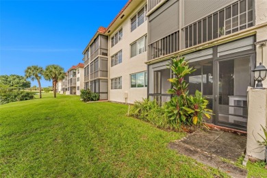 Welcome to this BEAUTIFUL 2/2 FIRST-FLOOR UNIT, located ON THE on Hollybrook Golf and Tennis Club  in Florida - for sale on GolfHomes.com, golf home, golf lot