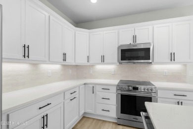 Welcome to The Courtyards by Carrell! This Capri Designer Luxury on Ocean Ridge Plantation in North Carolina - for sale on GolfHomes.com, golf home, golf lot