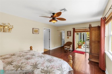 Unique Key West-style waterfront retreat in prestigious Golf on Plantation Preserve Golf Course in Florida - for sale on GolfHomes.com, golf home, golf lot