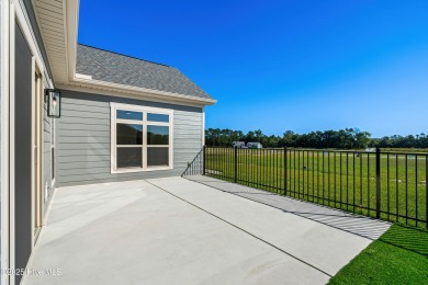Welcome to The Courtyards by Carrell! This Capri Designer Luxury on Ocean Ridge Plantation in North Carolina - for sale on GolfHomes.com, golf home, golf lot