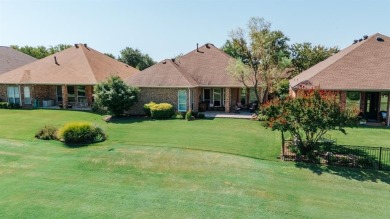 Welcome to your dream home on the 17th fairway of Heritage Ranch on Heritage Ranch Golf and Country Club in Texas - for sale on GolfHomes.com, golf home, golf lot