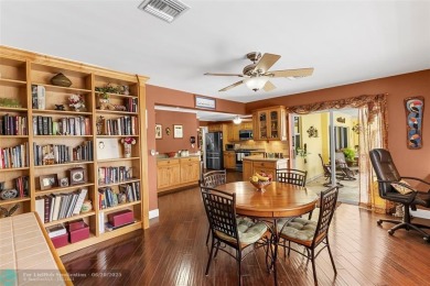 Unique Key West-style waterfront retreat in prestigious Golf on Plantation Preserve Golf Course in Florida - for sale on GolfHomes.com, golf home, golf lot