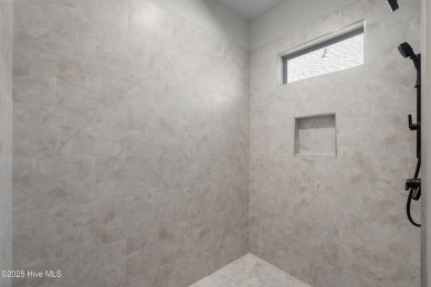 Welcome to The Courtyards by Carrell! This Capri Designer Luxury on Ocean Ridge Plantation in North Carolina - for sale on GolfHomes.com, golf home, golf lot