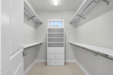 Welcome to The Courtyards by Carrell! This Capri Designer Luxury on Ocean Ridge Plantation in North Carolina - for sale on GolfHomes.com, golf home, golf lot