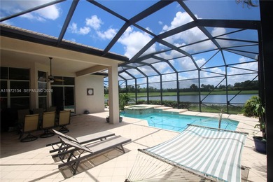 Enjoy breathtaking private sunset views from your screened patio on Ironhorse Country Club in Florida - for sale on GolfHomes.com, golf home, golf lot
