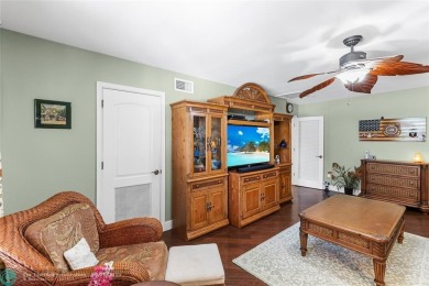 Unique Key West-style waterfront retreat in prestigious Golf on Plantation Preserve Golf Course in Florida - for sale on GolfHomes.com, golf home, golf lot