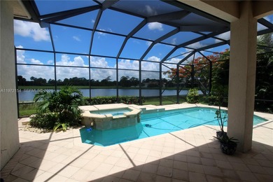 Enjoy breathtaking private sunset views from your screened patio on Ironhorse Country Club in Florida - for sale on GolfHomes.com, golf home, golf lot