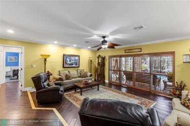 Unique Key West-style waterfront retreat in prestigious Golf on Plantation Preserve Golf Course in Florida - for sale on GolfHomes.com, golf home, golf lot