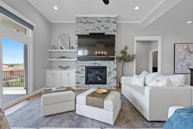 This 4-bedroom, 4-bath reverse 1.5-story is packed with upgrades on Heritage Park Golf Course in Kansas - for sale on GolfHomes.com, golf home, golf lot