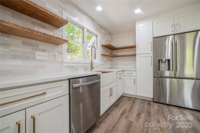 Live the Lake Wylie lifestyle in this beautifully updated 3BR/2 on Tega Cay Golf Club in South Carolina - for sale on GolfHomes.com, golf home, golf lot
