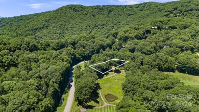 This rustic ranch, located w/in the exclusive Wolf Laurel on Wolf Laurel Country Club in North Carolina - for sale on GolfHomes.com, golf home, golf lot