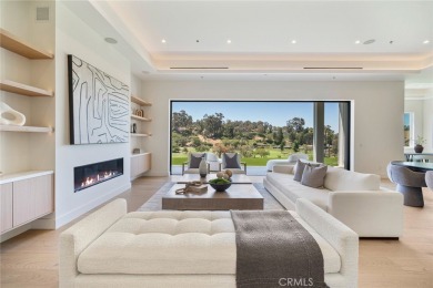 Rising above the prestigious El Niguel Country Club, this on El Niguel Country Club in California - for sale on GolfHomes.com, golf home, golf lot