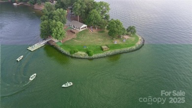 Live the Lake Wylie lifestyle in this beautifully updated 3BR/2 on Tega Cay Golf Club in South Carolina - for sale on GolfHomes.com, golf home, golf lot