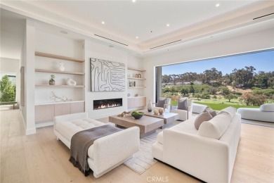 Rising above the prestigious El Niguel Country Club, this on El Niguel Country Club in California - for sale on GolfHomes.com, golf home, golf lot