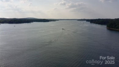 Live the Lake Wylie lifestyle in this beautifully updated 3BR/2 on Tega Cay Golf Club in South Carolina - for sale on GolfHomes.com, golf home, golf lot