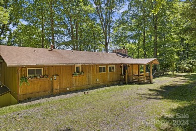 This rustic ranch, located w/in the exclusive Wolf Laurel on Wolf Laurel Country Club in North Carolina - for sale on GolfHomes.com, golf home, golf lot