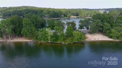 Live the Lake Wylie lifestyle in this beautifully updated 3BR/2 on Tega Cay Golf Club in South Carolina - for sale on GolfHomes.com, golf home, golf lot