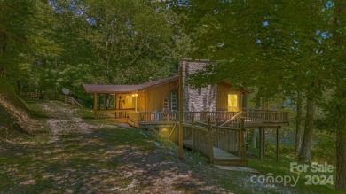 This rustic ranch, located w/in the exclusive Wolf Laurel on Wolf Laurel Country Club in North Carolina - for sale on GolfHomes.com, golf home, golf lot