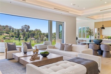 Rising above the prestigious El Niguel Country Club, this on El Niguel Country Club in California - for sale on GolfHomes.com, golf home, golf lot