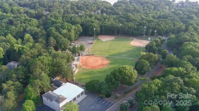 Live the Lake Wylie lifestyle in this beautifully updated 3BR/2 on Tega Cay Golf Club in South Carolina - for sale on GolfHomes.com, golf home, golf lot