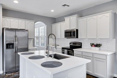 Beautifully updated home featuring a bright, open floor plan and on Verrado Golf Club  in Arizona - for sale on GolfHomes.com, golf home, golf lot