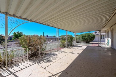 Just a little TLC needed to make this home a doll house. 2 large on PalmBrook Country Club in Arizona - for sale on GolfHomes.com, golf home, golf lot