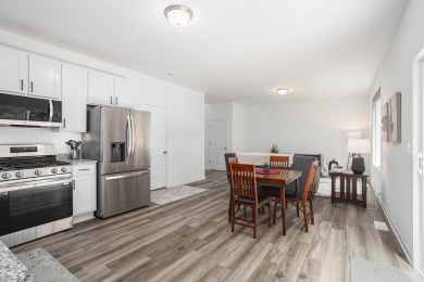 Call Clint Burghdorf  to tour this Turnkey Townhome at Emerald on Alwyn Downs Golf Club in Michigan - for sale on GolfHomes.com, golf home, golf lot