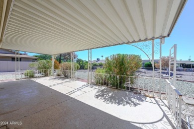 Just a little TLC needed to make this home a doll house. 2 large on PalmBrook Country Club in Arizona - for sale on GolfHomes.com, golf home, golf lot