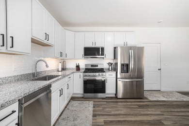Call Clint Burghdorf  to tour this Turnkey Townhome at Emerald on Alwyn Downs Golf Club in Michigan - for sale on GolfHomes.com, golf home, golf lot