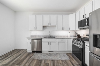 Call Clint Burghdorf  to tour this Turnkey Townhome at Emerald on Alwyn Downs Golf Club in Michigan - for sale on GolfHomes.com, golf home, golf lot