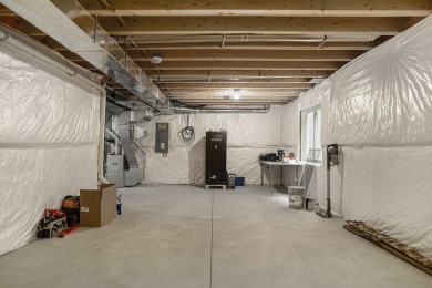 Call Clint Burghdorf  to tour this Turnkey Townhome at Emerald on Alwyn Downs Golf Club in Michigan - for sale on GolfHomes.com, golf home, golf lot