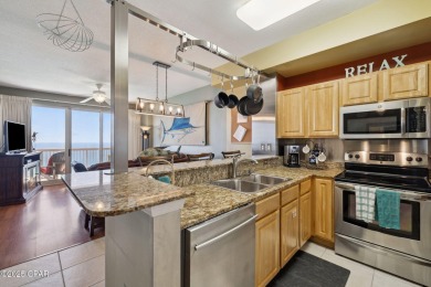 Wake up to the sound of waves and panoramic Gulf views from your on Holiday Golf Club in Florida - for sale on GolfHomes.com, golf home, golf lot
